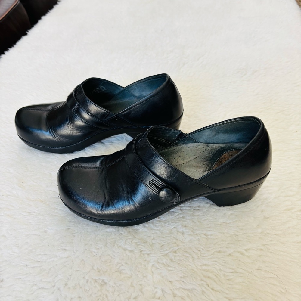 Dansko Black Leather Slip-On Clogs - Picture 2 of 13